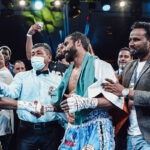 Roshan Nathanial working with boxing talent during professional training